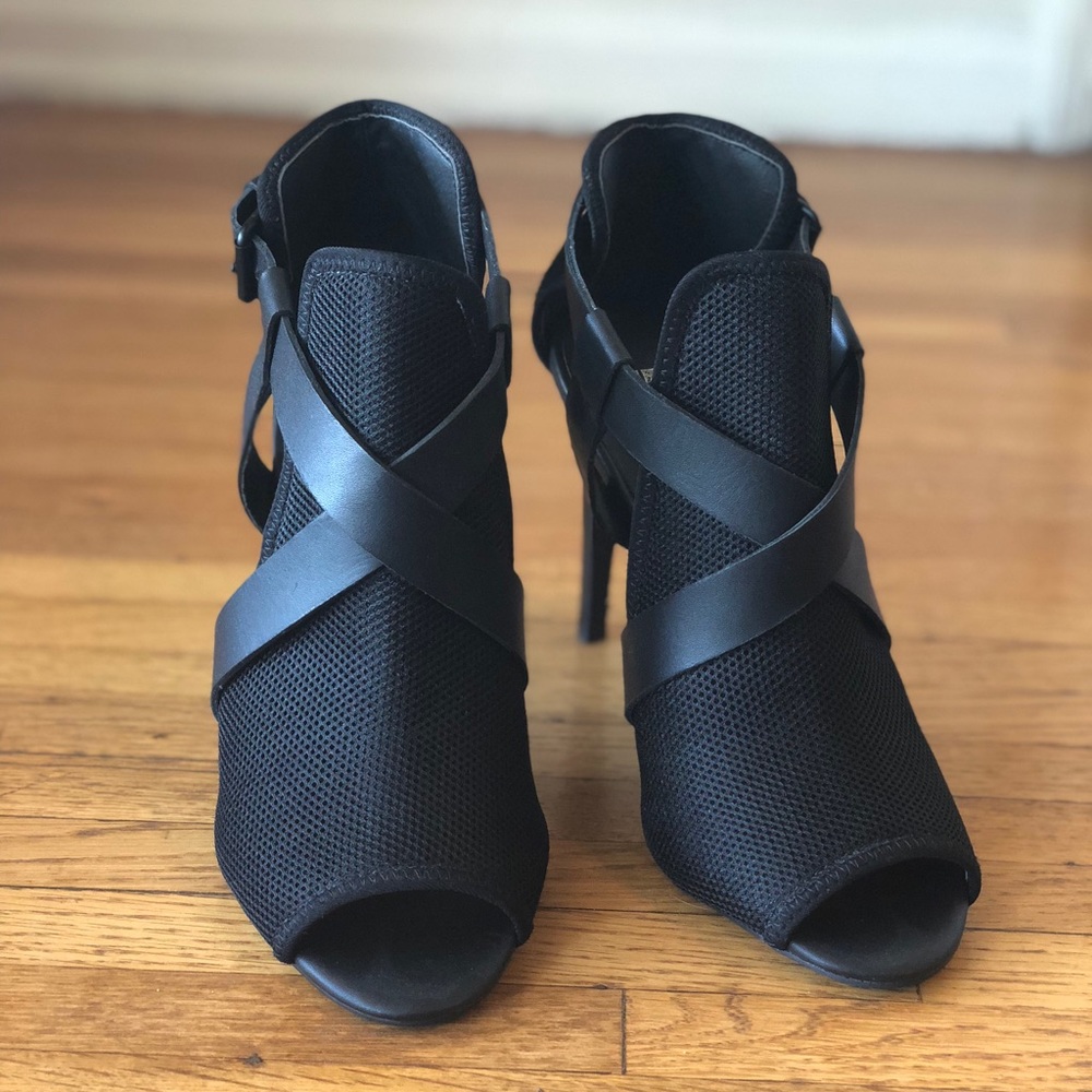 Joe’s black leather and mesh heels